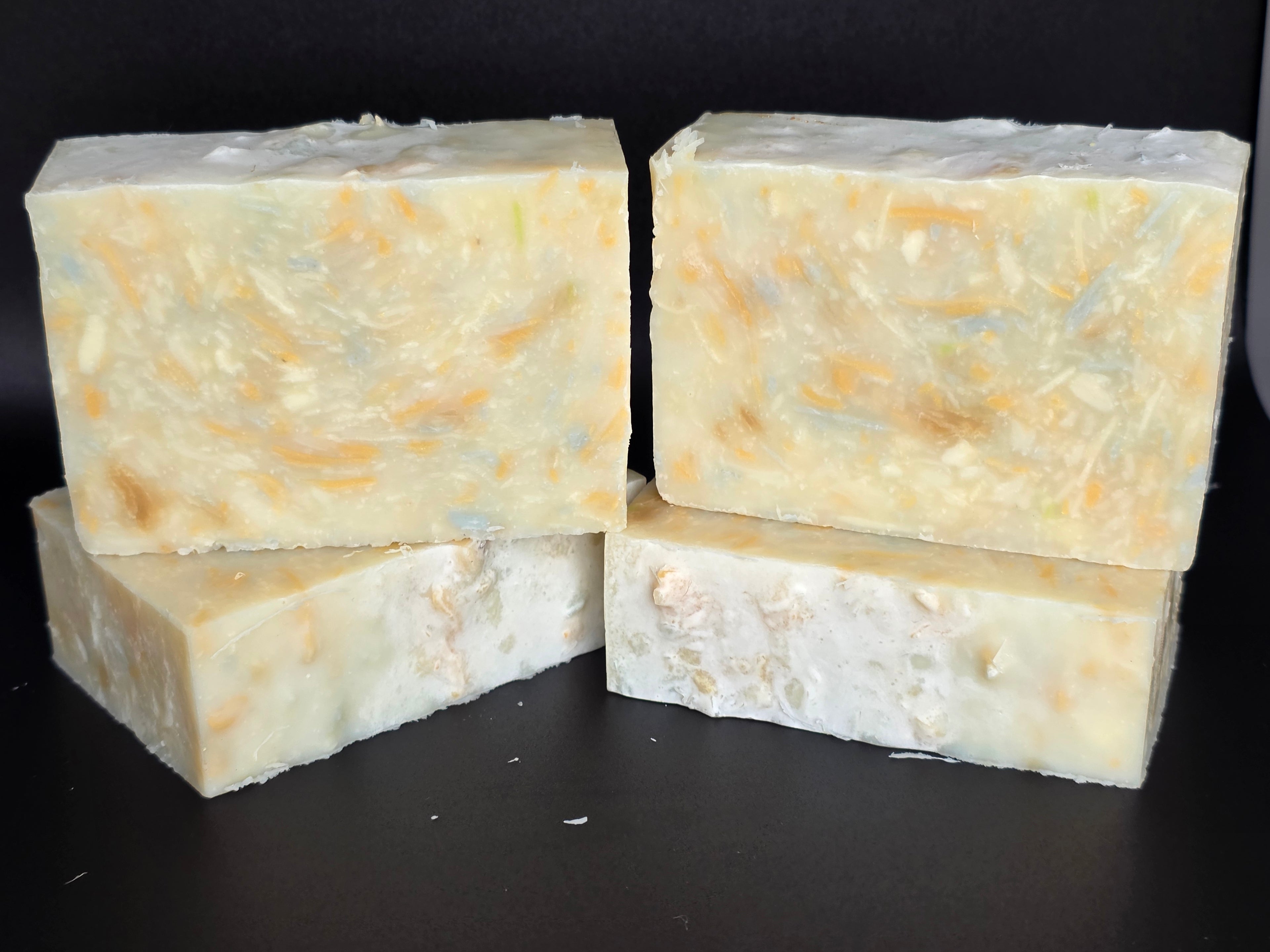 Upcycle Champagne - a handcrafted cold process soap made in small batches using recycled soap shavings from previous MessyMessy1 batches, creating a unique confetti-style design with a light champagne-inspired scent.
