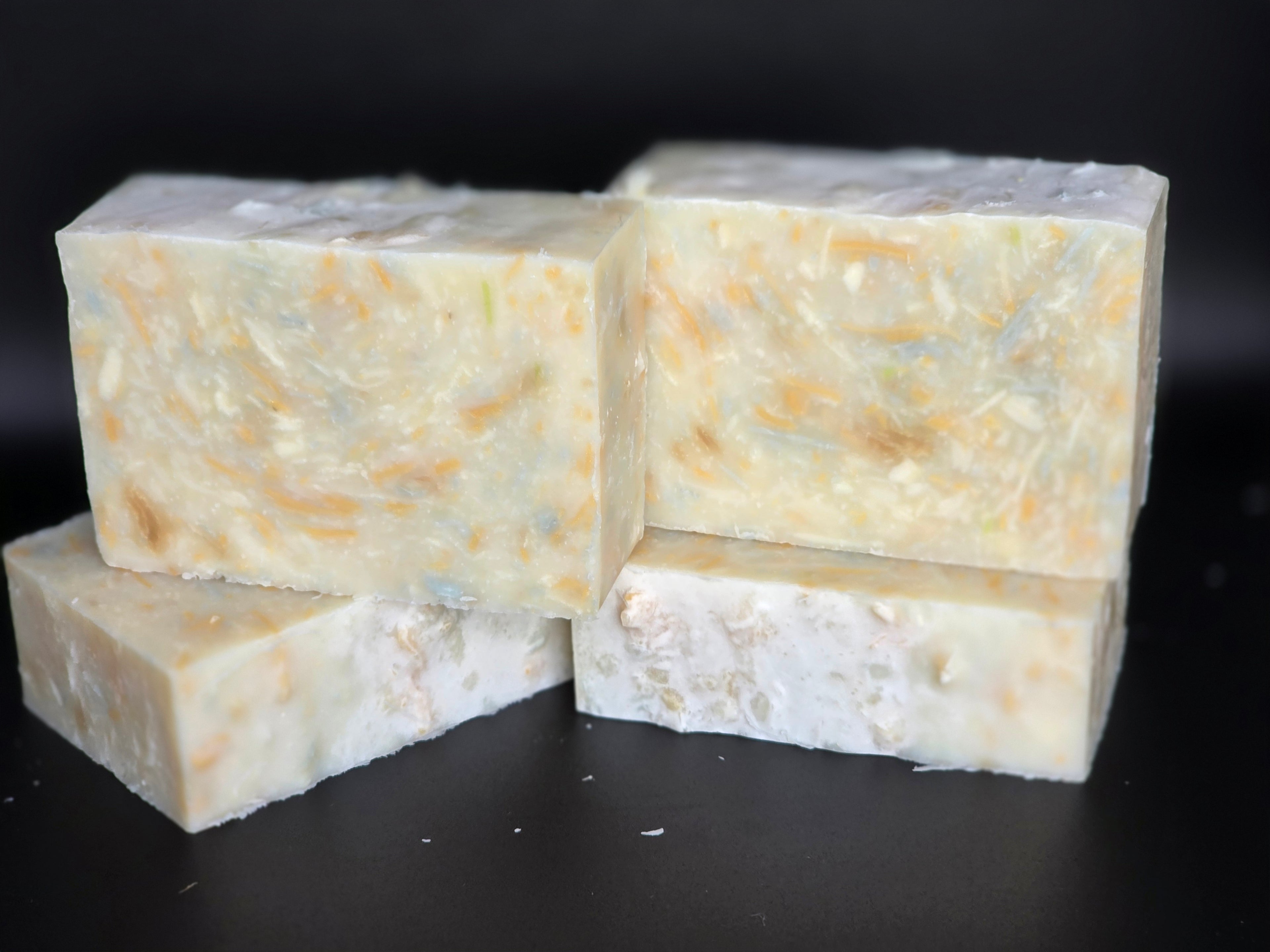 Upcycle Champagne - a handcrafted cold process soap made in small batches using recycled soap shavings from previous MessyMessy1 batches, creating a unique confetti-style design with a light champagne-inspired scent.