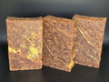 Gilded Espresso is a handcrafted cold process soap made in small batches with rich espresso and dark chocolate notes, natural coffee elements, and a gold-veined design.