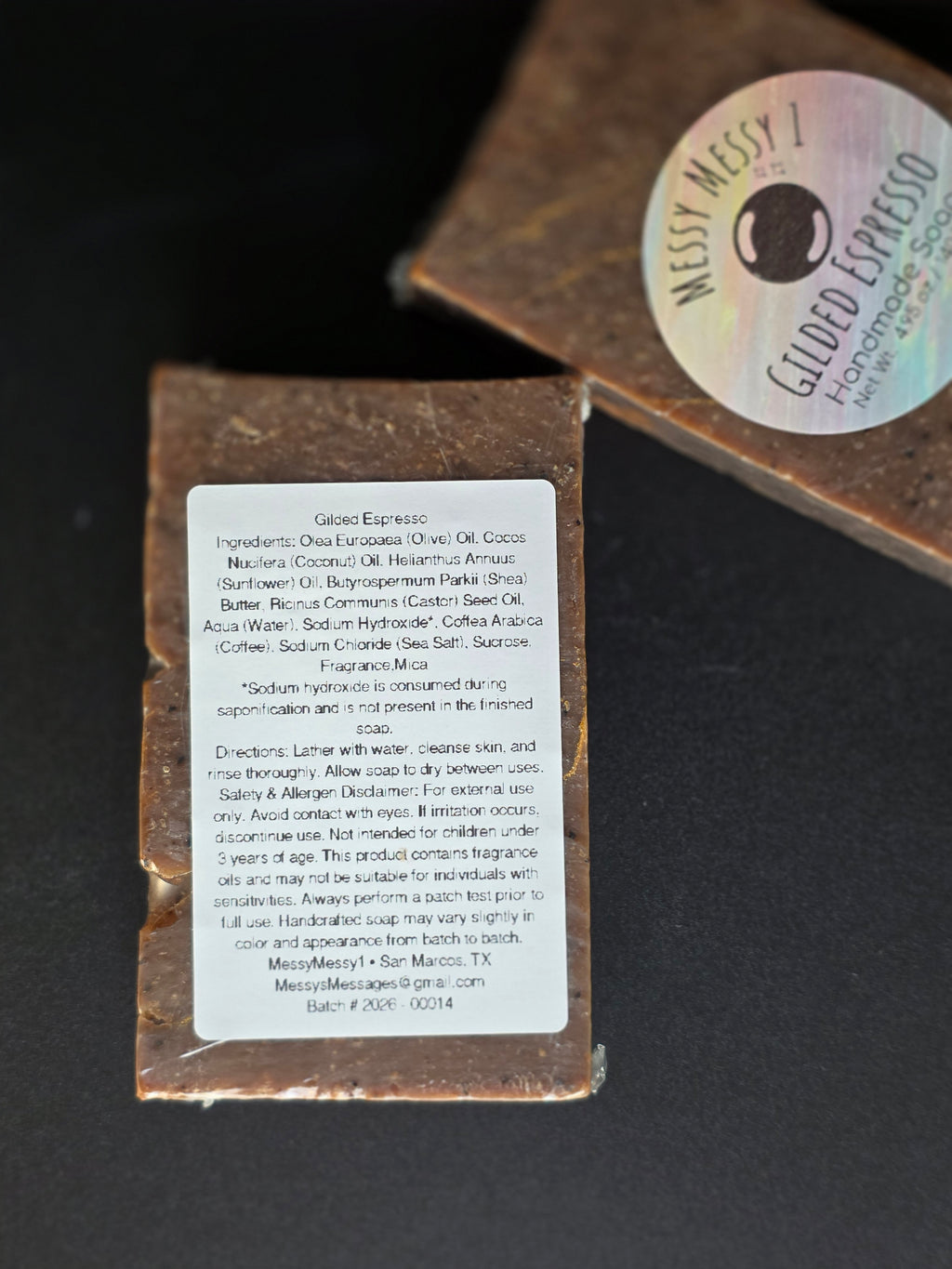 Gilded Espresso is a handcrafted cold process soap made in small batches with rich espresso and dark chocolate notes, natural coffee elements, and a gold-veined design.