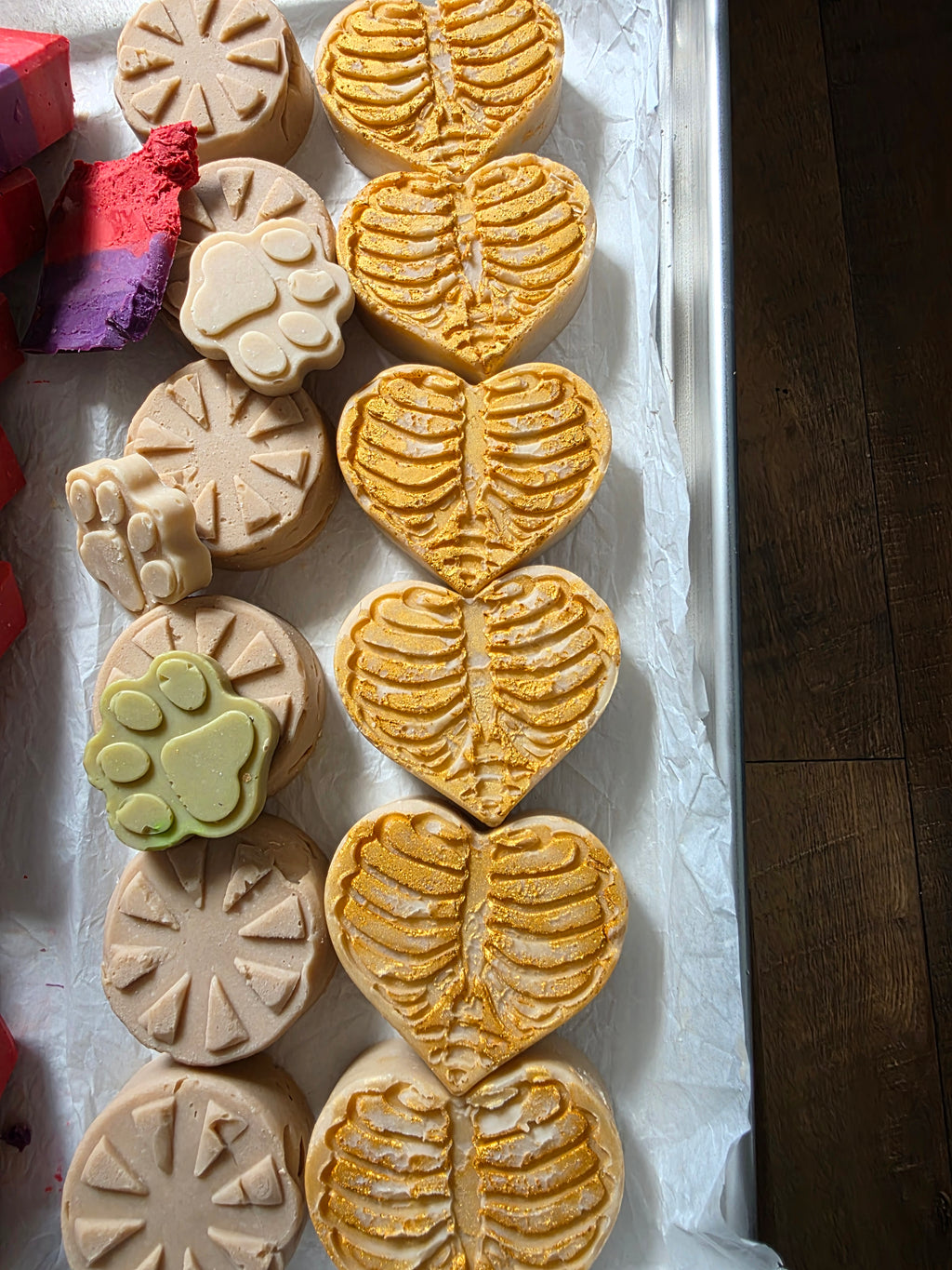Golden Remains is a handcrafted cold process soap made in small batches from leftover Spring Solstice batter, poured into a detailed heart mold with a skeletal design and finished with gold mica. Lmited soap